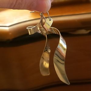 Twisty corkscrew gold plated dangle earrings